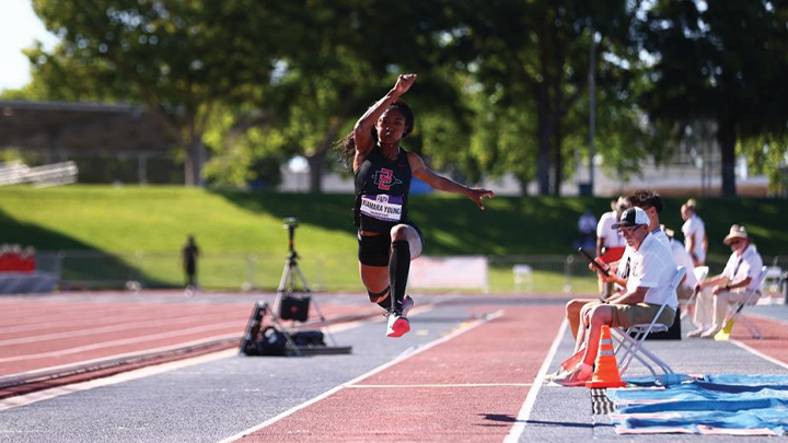 SDSU junior Xiamara Young leaps during triple jump competition.