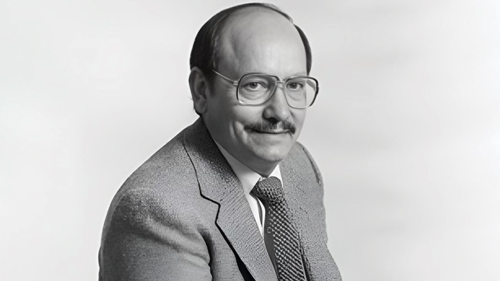 Alfredo ‘Al’ Merino shown in a 1984 black and white photo dressed in a suit and tie.