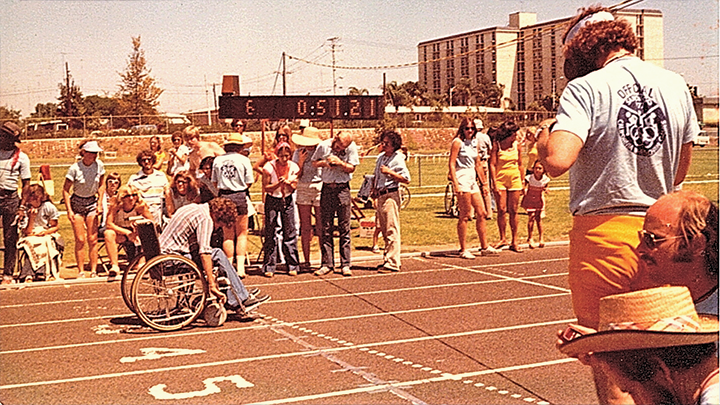 SDSU alumnus Peter Phillips crosses the finish line from the third lane, winning third place in the 100 yard dash during the 1977 California State Games held on campus. (Courtesy: Peter Phillips)