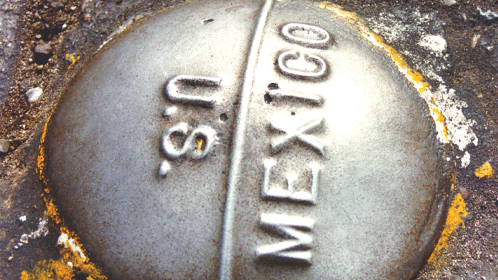 US-Mexico border marker at the San Ysidro, San Diego crossing. 