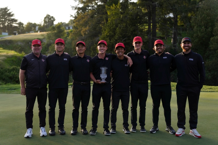 SDSU's men's golf team pose with their trophy at Pasatiempo Golf Club in Santa Cruz.