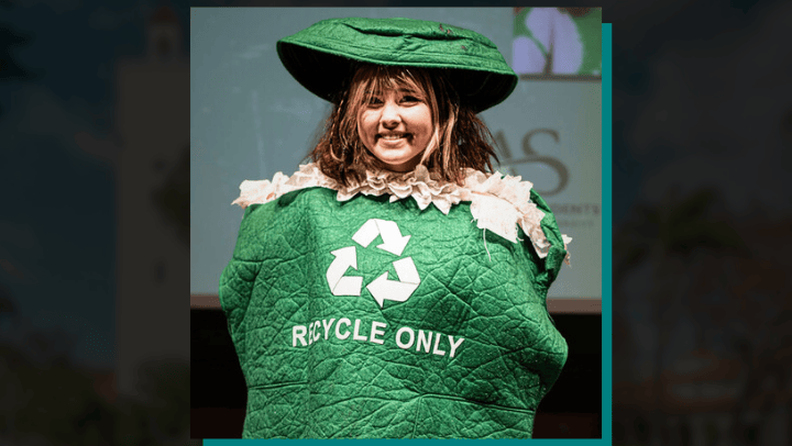 A student wears a recycling bin costume to SDSU's Sustainability Summit