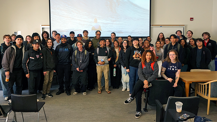 After the SOC 331 class, students gather for a group photo with guest speaker Steve Hawk and Professor Mike Roberts. (Leslie L.J. Reilly/SDSU)