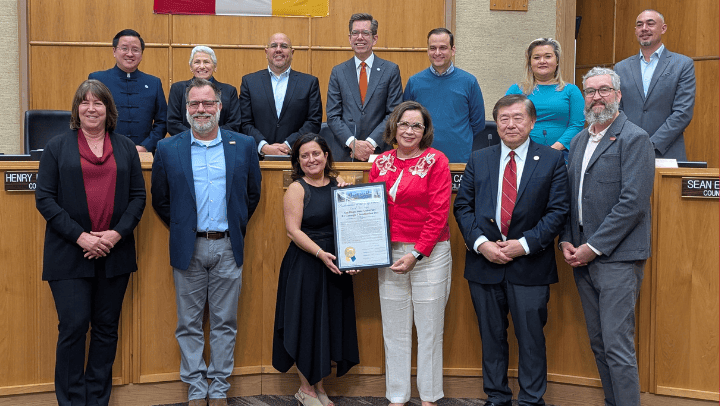 SDSU's Vice President for Research and Innovation Hala Madanat and President Adela de la Torre hold a City of San Diego proclamation declaring May 13 as SDSU R1 Carnegie Classification Day. The honor celebrates SDSU’s elevation to R1 status, the highest tier of research universities, recognizing its national leadership in research and commitment to student success. (SDSU)