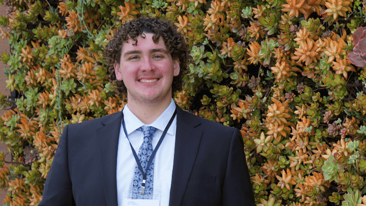 Ethan Pellegrinii on the second floor of the Conrad Prebys Aztec Student Union after his presentation at the SDSU Student Symposium in May. (Leslie L.J. Reilly/SDSU)