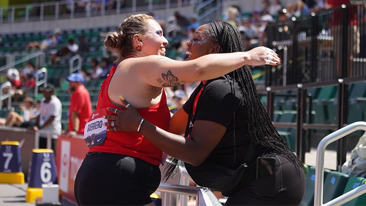 Alicia Guerrero celebrates with coach Jasmine Burrell after setting a new American record in the F64 shot put division.