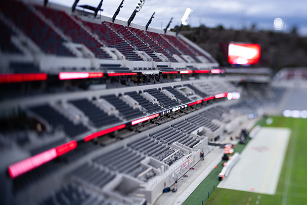 A blurry image of three tiers of a stadium.