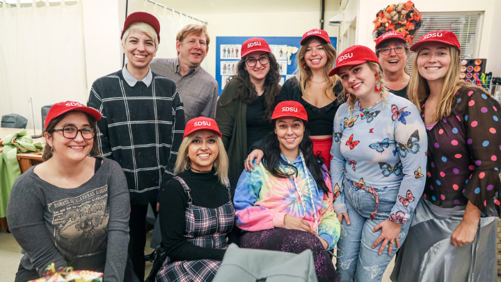 Groupp of students with sdsu hats on